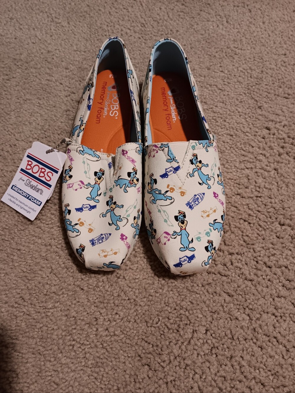 Skechers BOBS Cream Slip-On Shoes with Blue Cartoon Print. NWT W7.5.